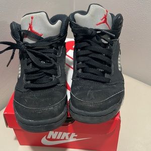 All black retro Jordan 5’s